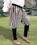 Bucaneer pants in traditional pirate stripes with black, close-fitting lace-up cuffs from knee to ankle.