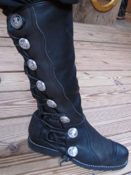 King Richard boots in heavy black leather with silver conches.