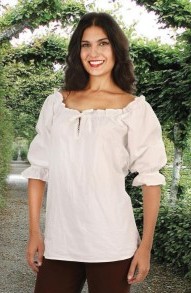 Faire Blouse in wh ite, also in black.