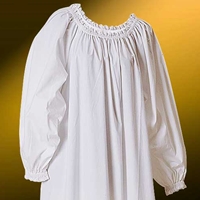 Close-up view of neckline and sleeves of lace-edged chemise in white.